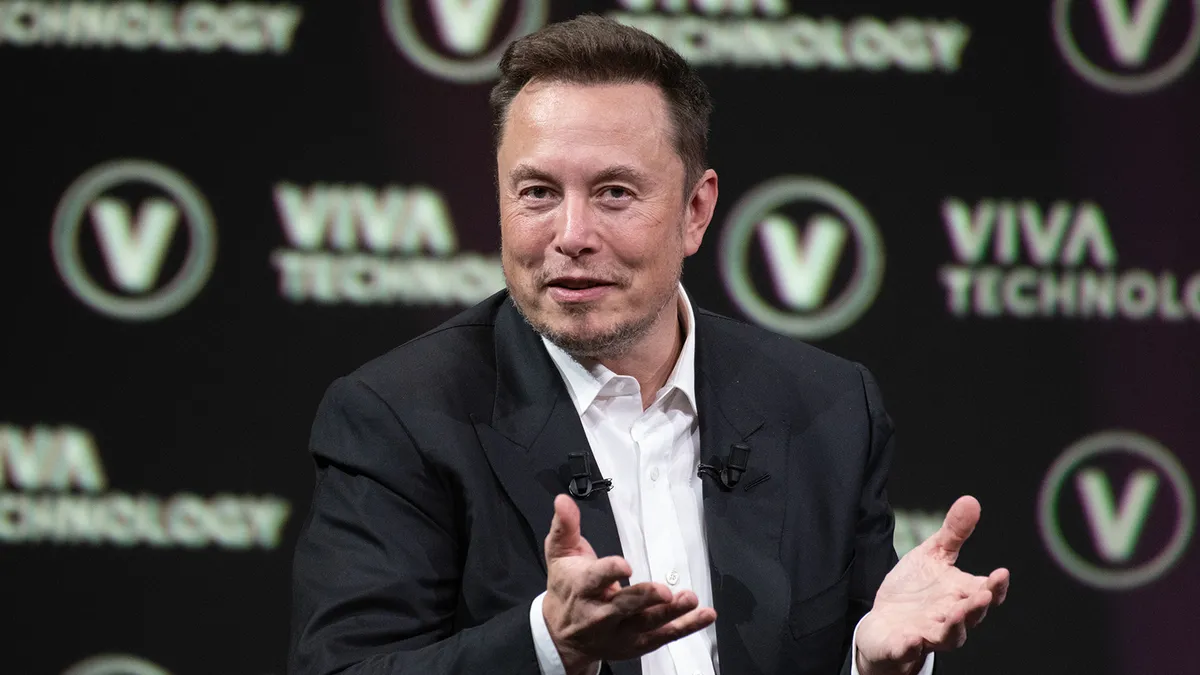 how much does elon own of tesla